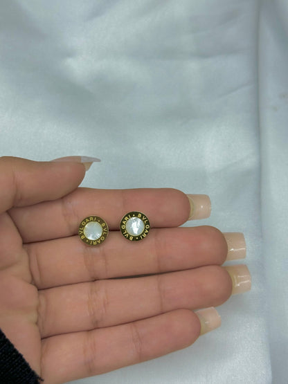 White Bvlgari engraved studs