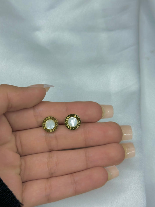 White Bvlgari engraved studs
