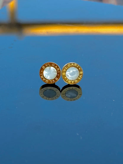 White Bvlgari engraved studs
